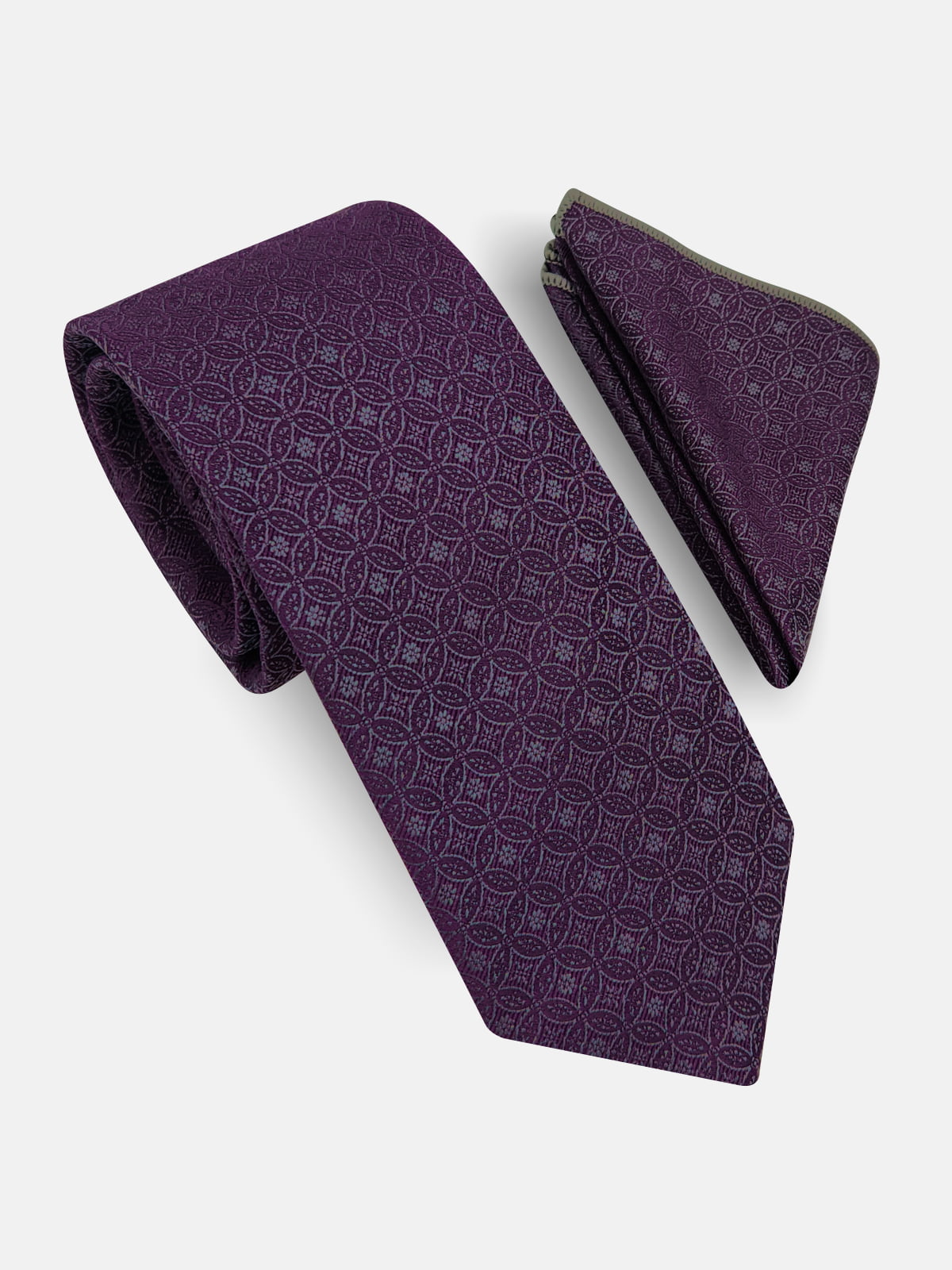 Milleniva mor mozaik desenli mikrofiber erkek kravat ve mendil seti. Şık ve modern iş kombinleri için ideal aksesuar.